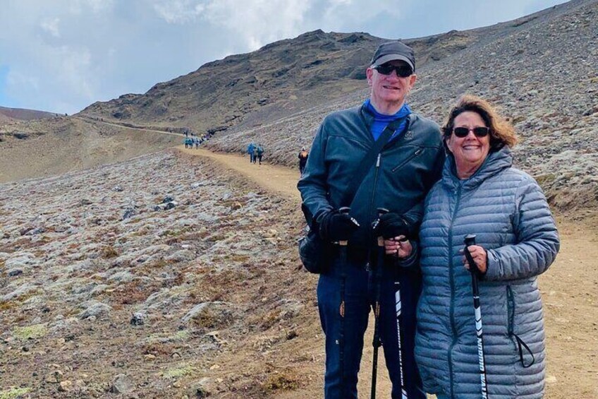 A couple hiking in one of the volcano trails. October 2021