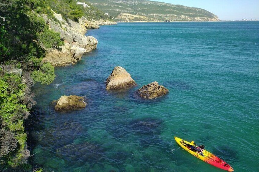 Kayak along untouched coastline