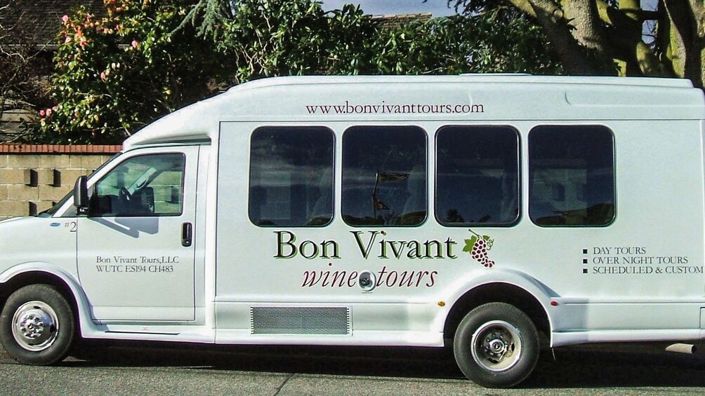 White Bon Vivant tour bus.