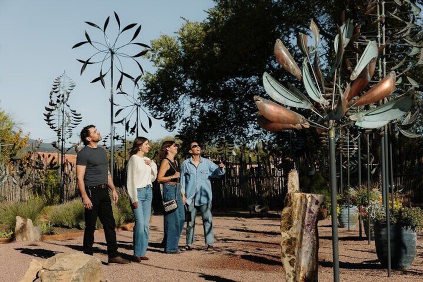 One of our groups enjoys the iconic wind sculpture garden at a gallery on Canyon Road.