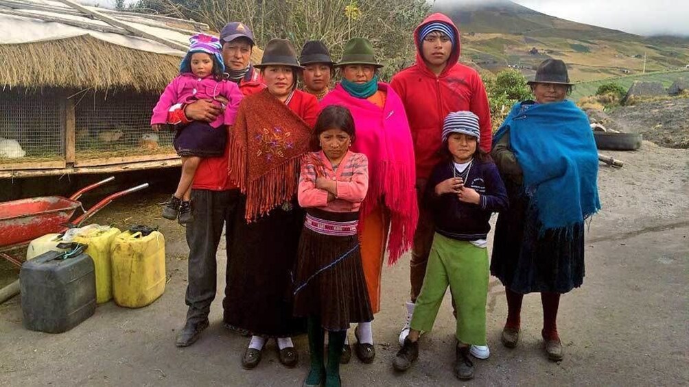 villagers standing for a photo in Quito