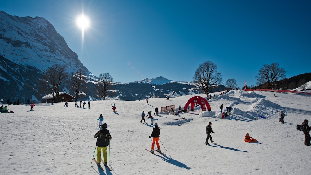 A ski area on a cloudless day in the Swiss Alps