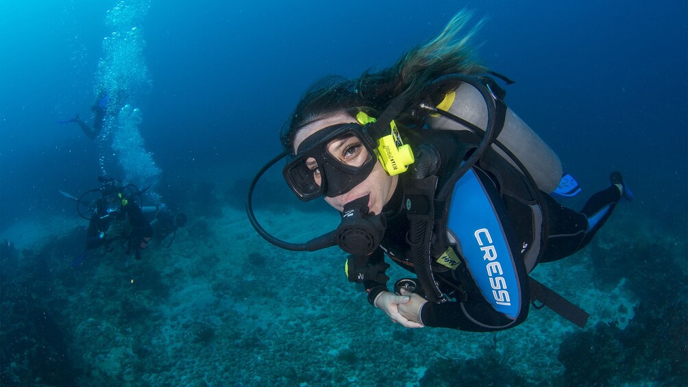 Woman on the MUSA Underwater Museum Diving tour in Cancun 