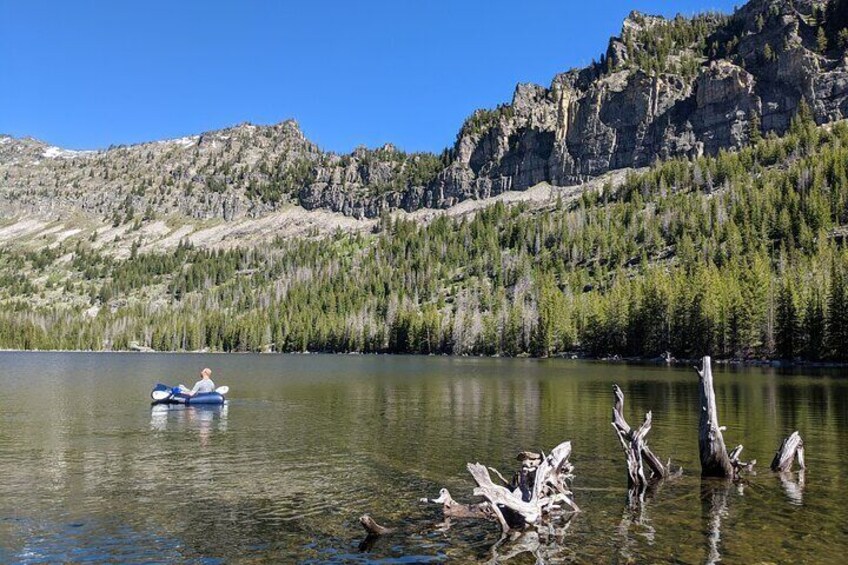 Kayak on a quiet mountain lake.