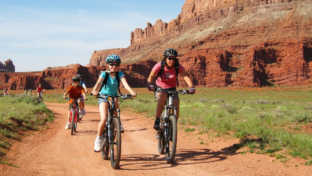 group riding bikes around the mountain in Green River