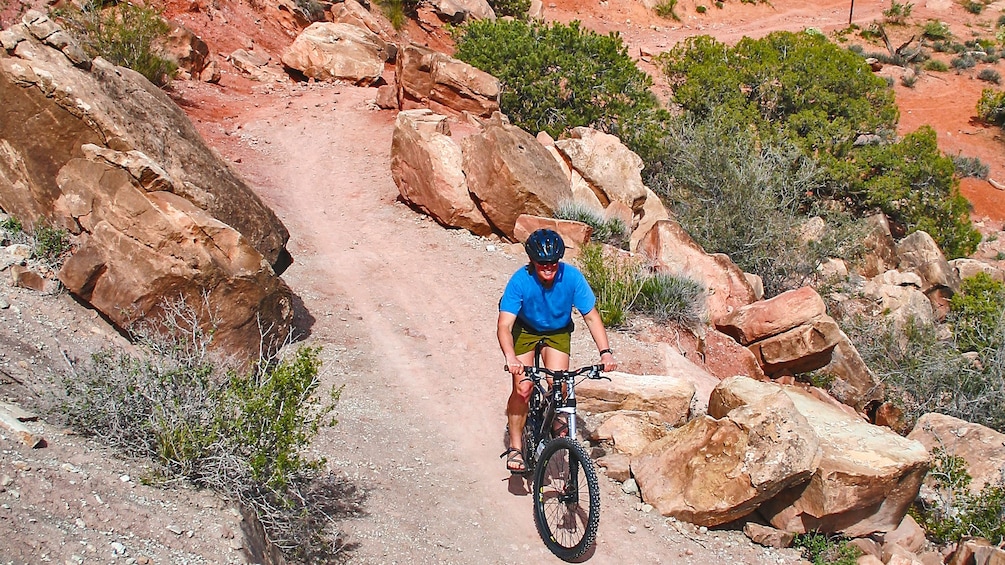 Man descending down bike path in Klondike Bluff.