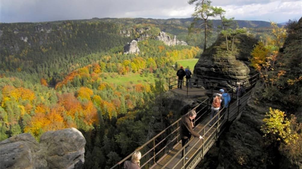 Show item 5 of 10. Tour group enjoying the Bohemian Saxon Switzerland