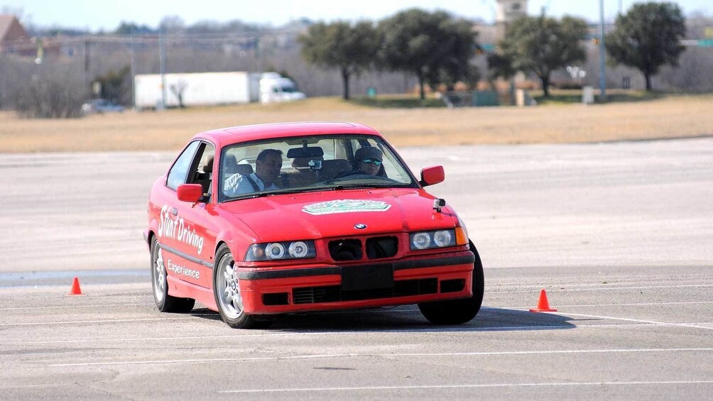 Show item 2 of 5. stunt driver weaving through traffic cones in Ontario