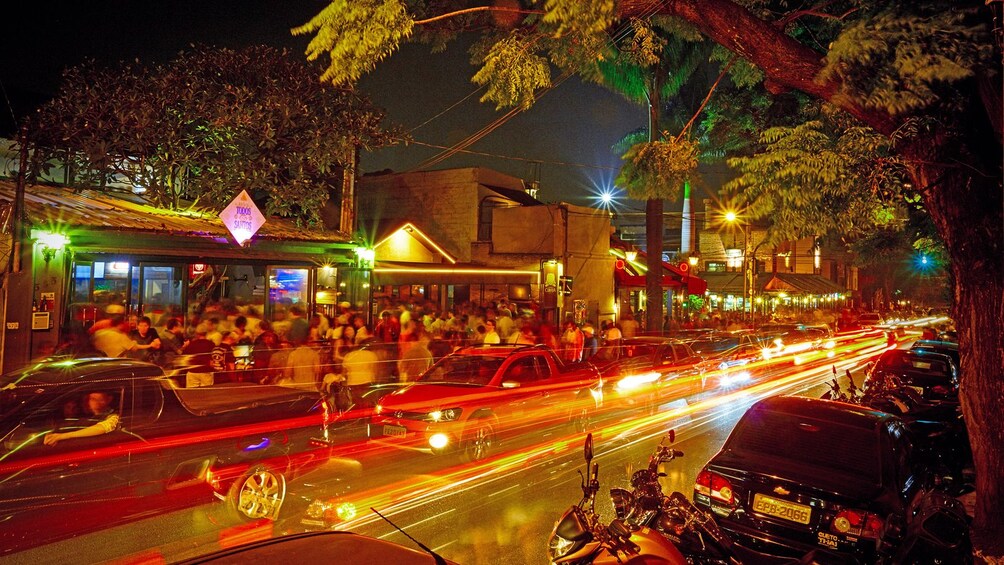Show item 3 of 4. crowded streets at night in Brazil