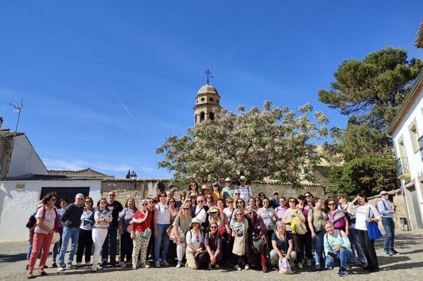 Guided group tour in Baeza, with the Cathedral looming.