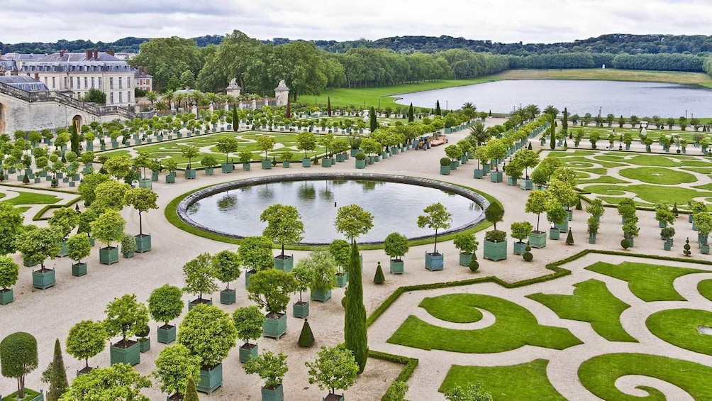 symmetrical garden and pond design outside of Versailles in Paris