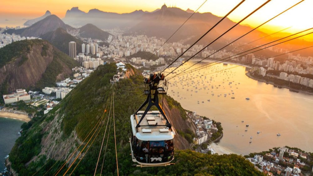 Gondola over Rio De Janeiro at sunset