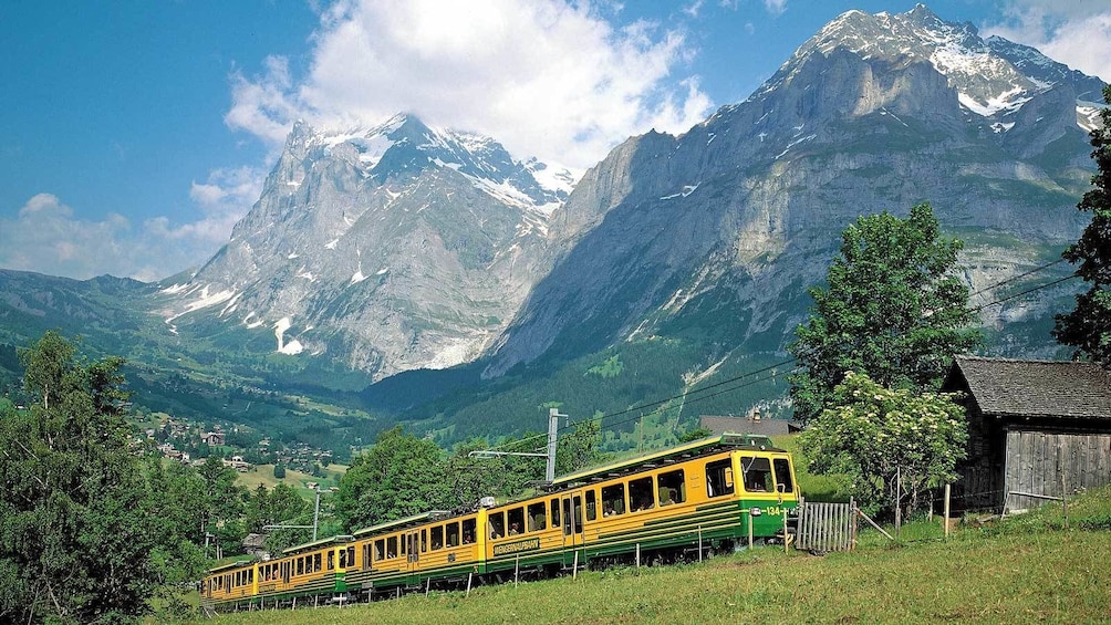 view of the mountain ranges from the train in Switzeroand