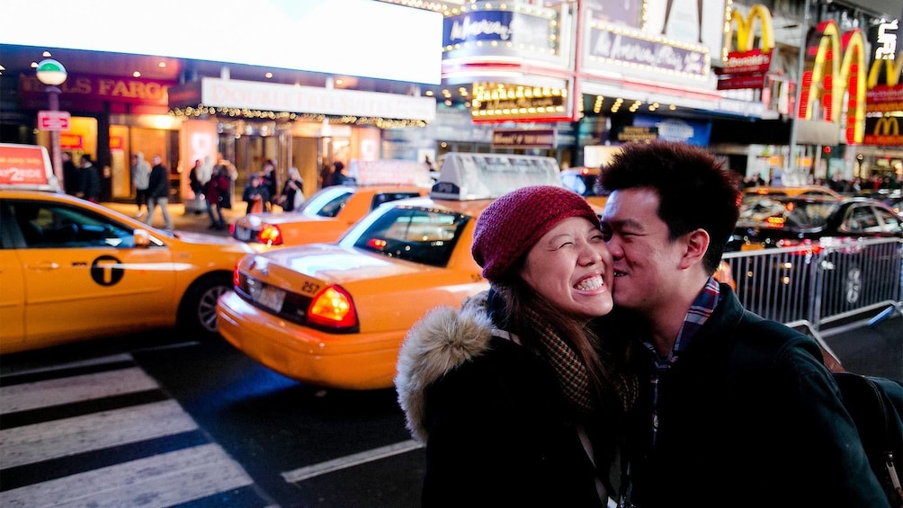 Couple on a photo shoot at night in New York