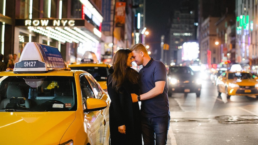 Couple on a photo shoot in New York at night 