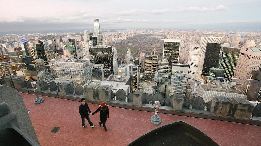 Day view of a Couple on a photo shoot at the top of the rock in New York 