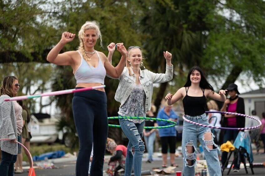 Katie teaching hooping techniques