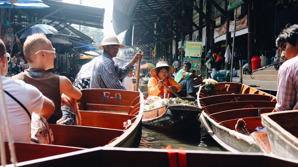Show item 2 of 6. View from a boat of the Damnoen Saduak Floating Market in Bangkok, Thailand