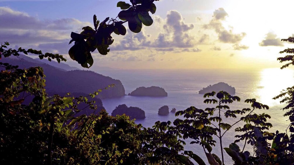 watching the sun set from the beach in Trinidad and Tobago