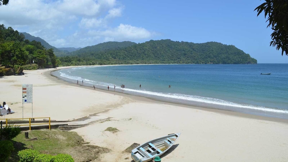 beachgoers enjoying the sun in Trinidad and Tobago