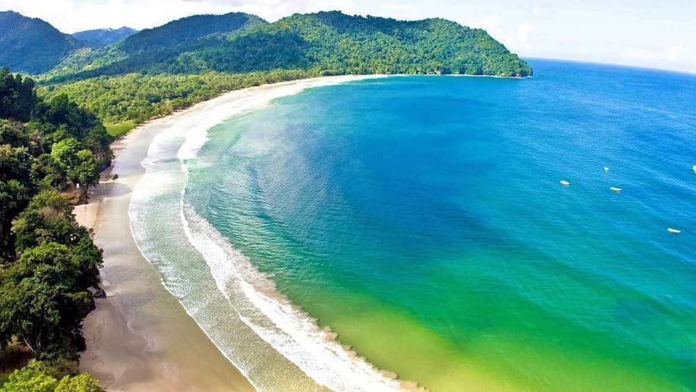 visiting a crescent shaped beach in Trinidad and Tobago