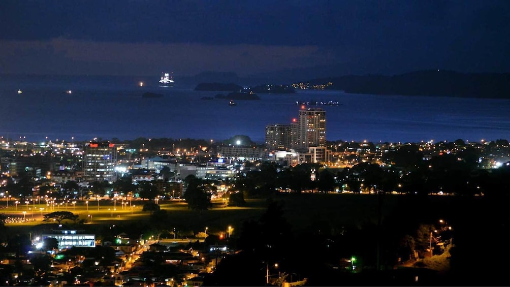 the city lit at night in Trinidad and Tobago