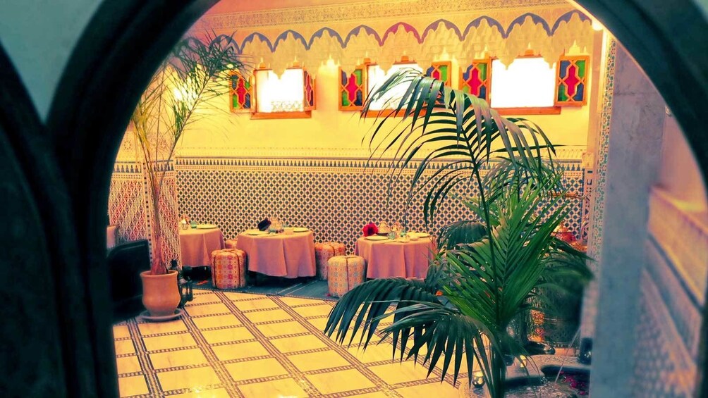 tables set up inside a restaurant in Marrakech