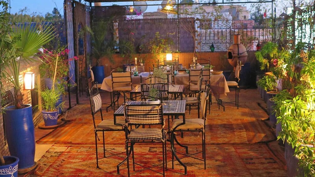 small dining area outside during the evening in Marrakech