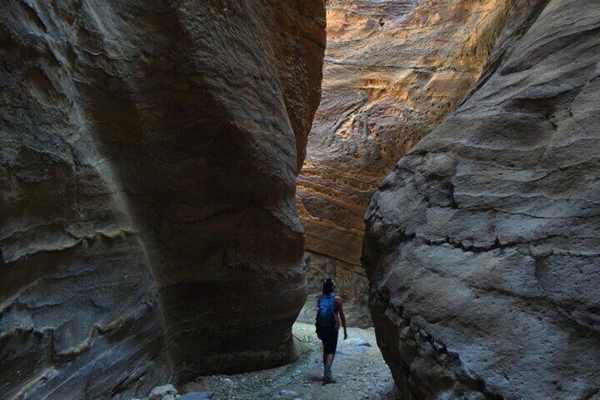 The trail starts in a narrow canyon