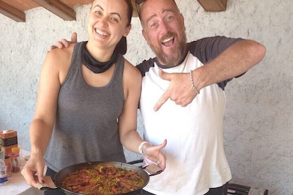 Paella Master-Class, Winery Visit and Bike Ride with Hotel Pickup from Sitg...