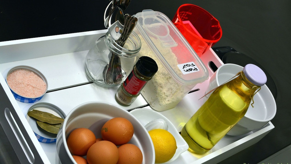 Show item 3 of 5. close up of preparations at cooking school