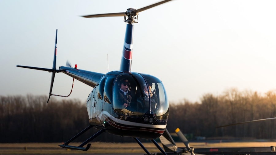 Helicopter landing in a field in New York