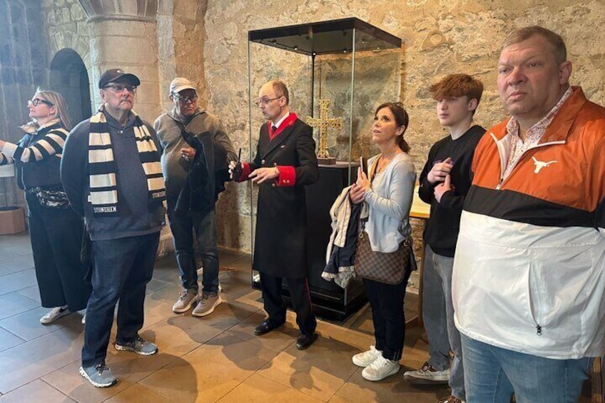 White Tower Warden and tour guests inside the White Tower