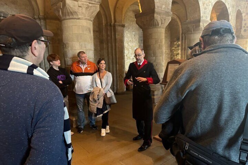 White Tower Warden and tour guests inside the White Tower