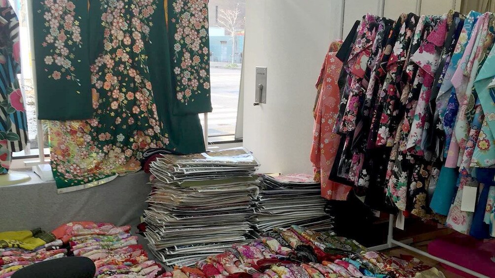 Show item 3 of 5. Colorful kimonos in a shop in Nagoya