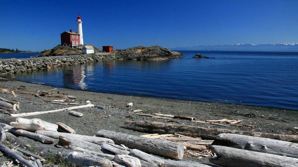 Show item 5 of 5. Beach and lighthouse in Victoria