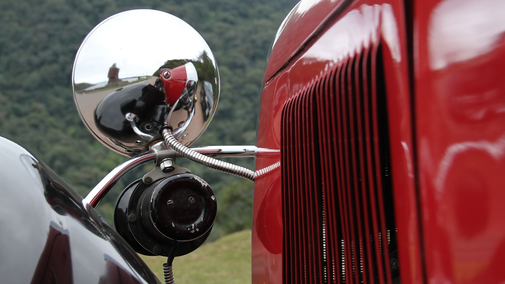 Show item 4 of 5. close up of red antique car