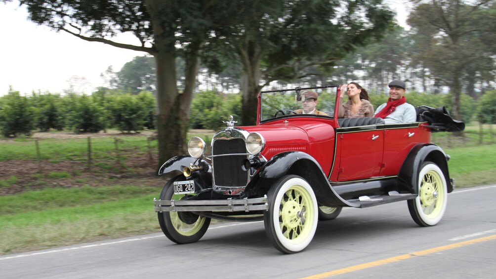 Show item 2 of 5. antique car on road