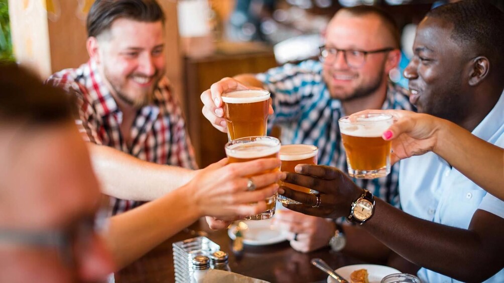 Group enjoying beers on the  U Street Food Tour in DC