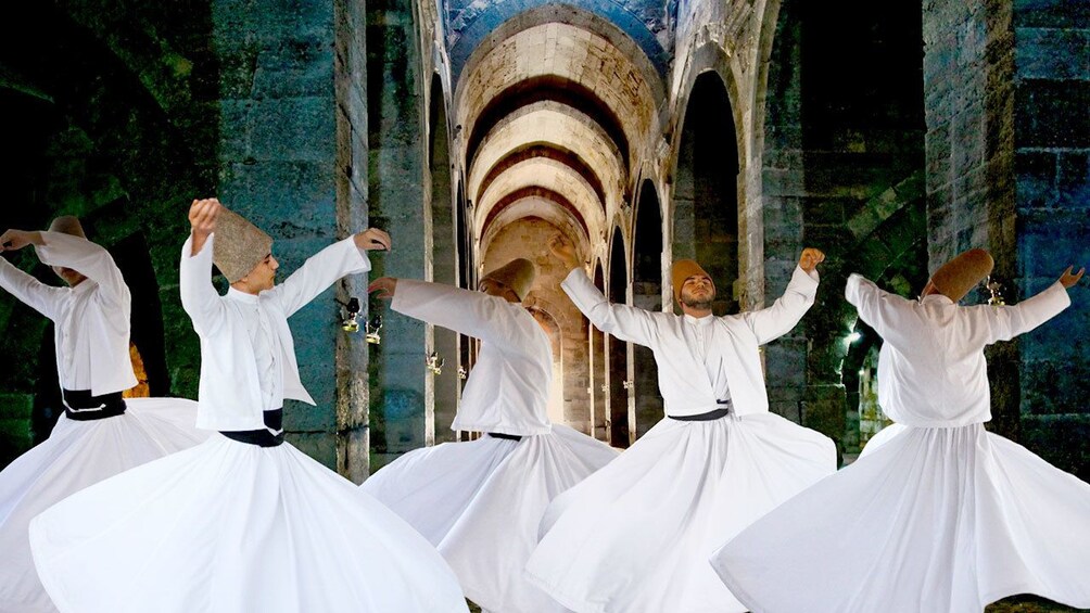Charger l’élément 5 sur 5. Whirling Dervishes in a stone hall