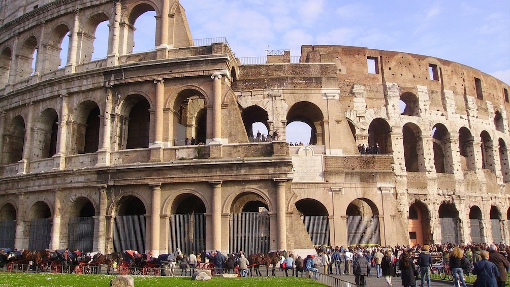 People outside of the coliseum in Rome