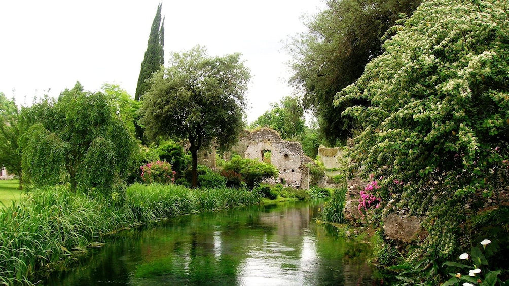 Pond, ruins and garden in the Oasi di Ninfa