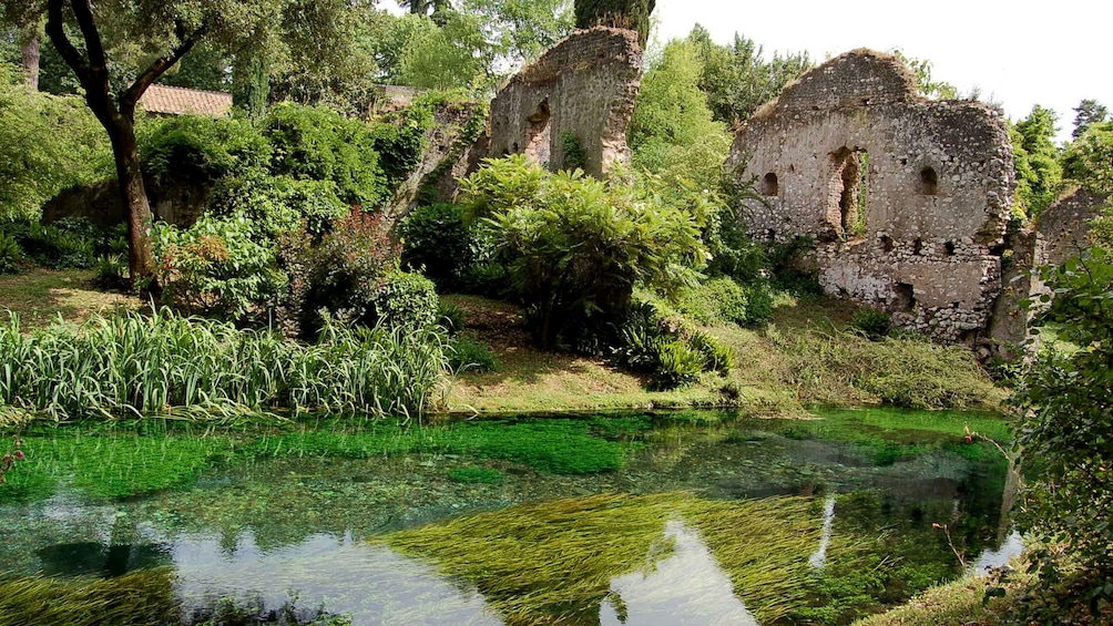 Ancient ruins near pond in Rome