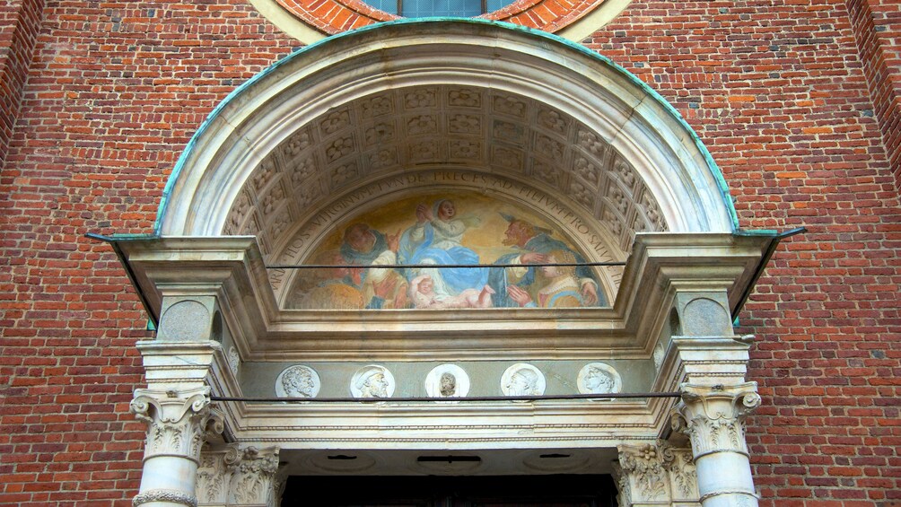 Painting above arched doorway at Santa Maria Delle Grazie in Milan