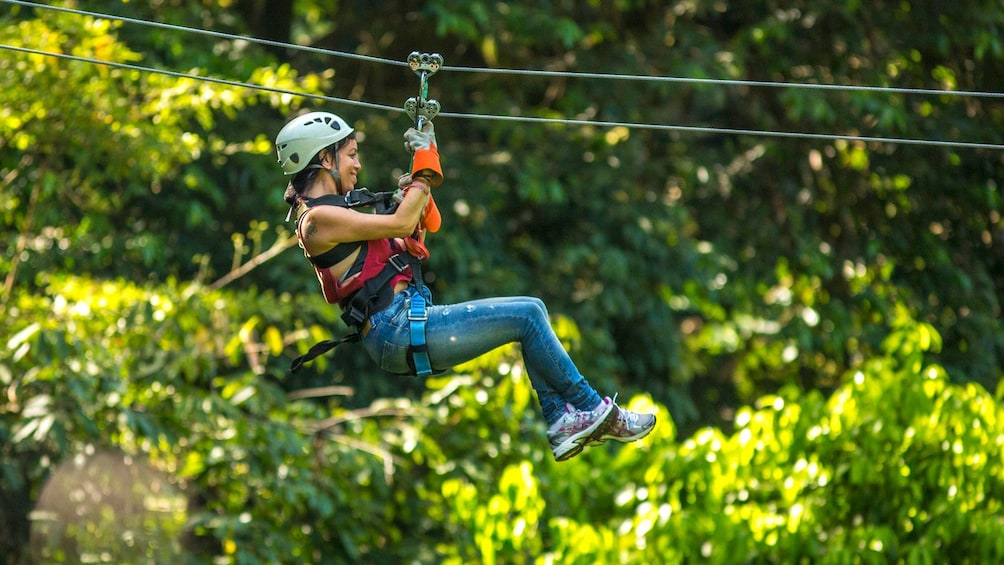 woman zip lining in Costa Rica
