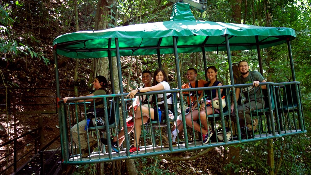 taking a caged tram in Costa Rica