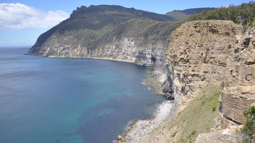Show item 5 of 5. Serene view of the coast on the East Coast and Maria Island Tour in Australia