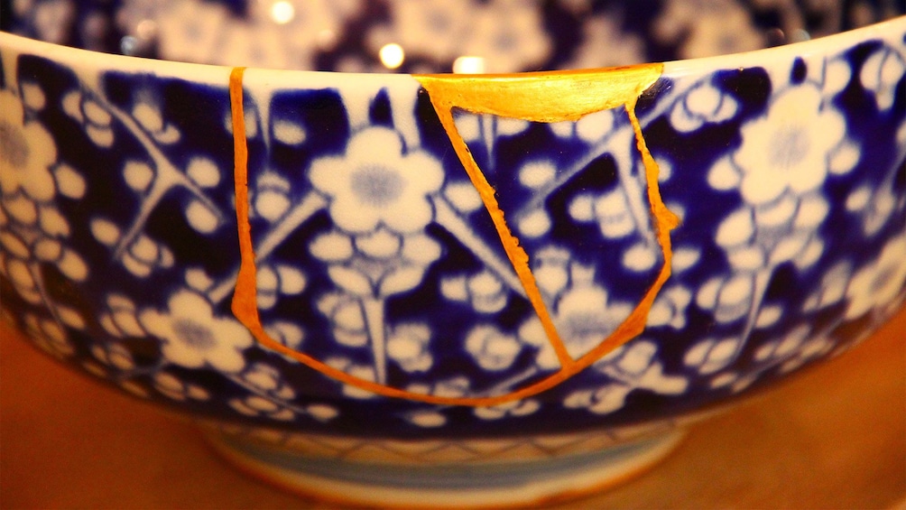 Show item 2 of 10. View of a bowl that was repaired at the Kintsugi Pottery Repairing Experience in Tokyo