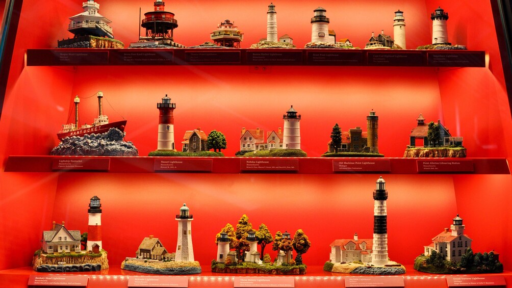 Show item 1 of 6. Shelves of miniature lighthouses