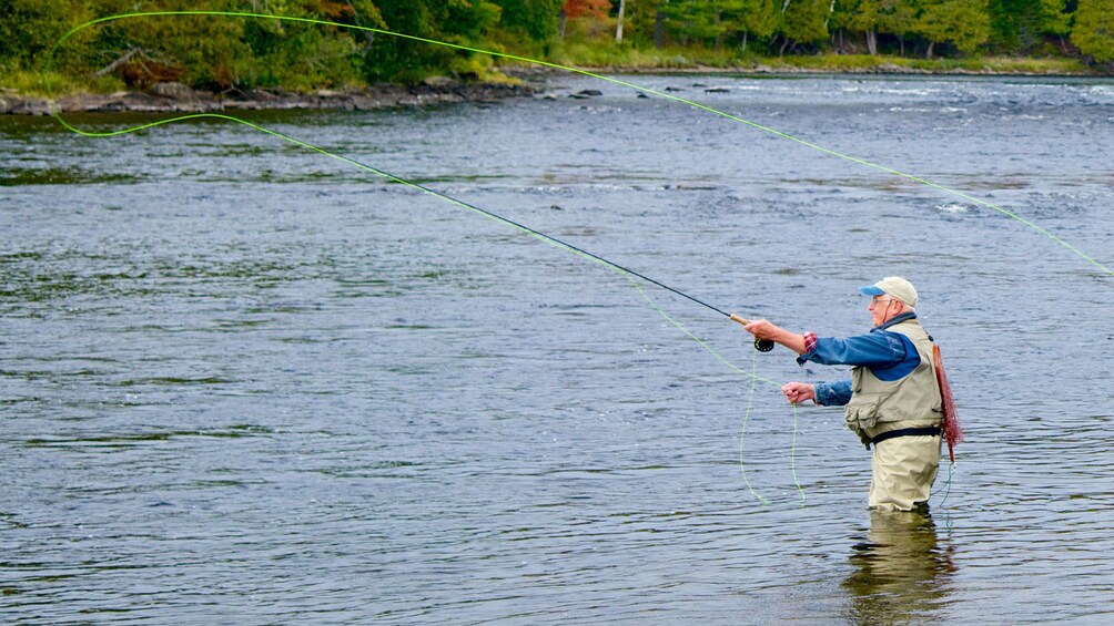 Man fly fishing in Fairbanks